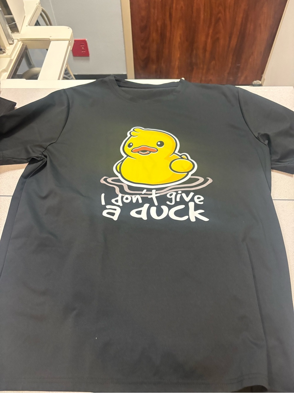 SHEIN Black Short Sleeve Tee with Yellow Duck Graphic